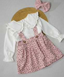 Un ensemble chic et confortable alliant la noblesse du velours (Gatifa) et la douceur du molleton non gratté. Parfait pour un look quotidien élégant ou pour une petite fête. Composition : Jupe salopette à fleurs et Pull blanc à col volanté. Matière : Velours souple et Molleton léger (French Terry).